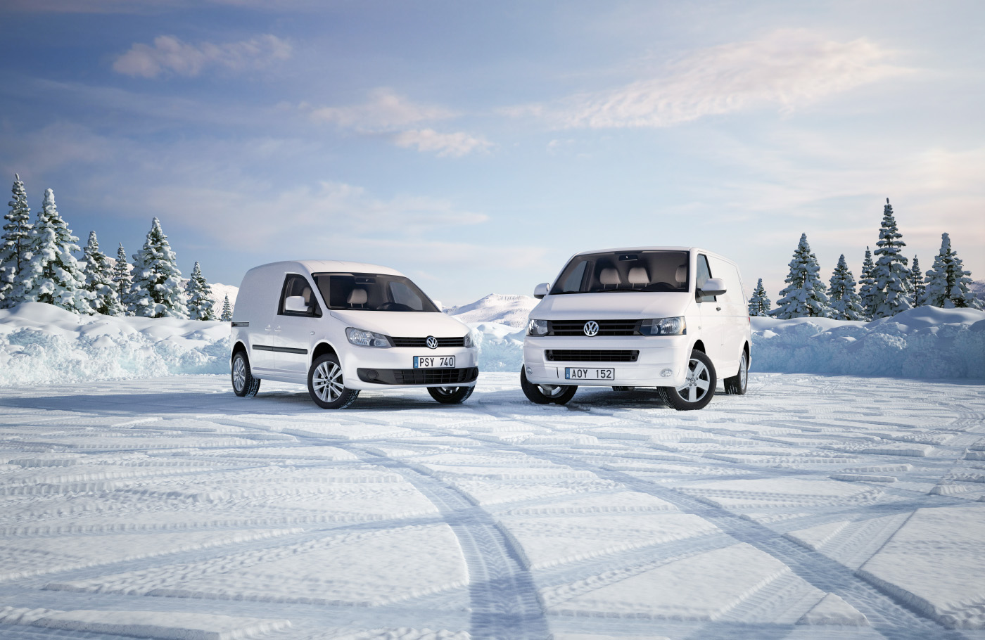 Volkswagen trasporter and Caddy at a parkingplace in the winter, at sunset and midnight frozen cars with frost and ski tracks and path. Vinter bilar snö