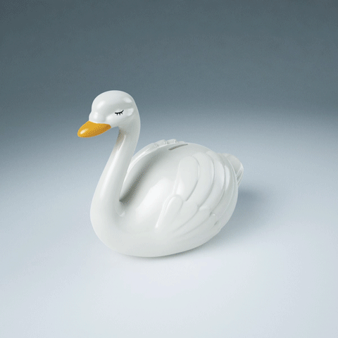 A swan money box of porcelain for EXACT, svan sparbössa porslin 